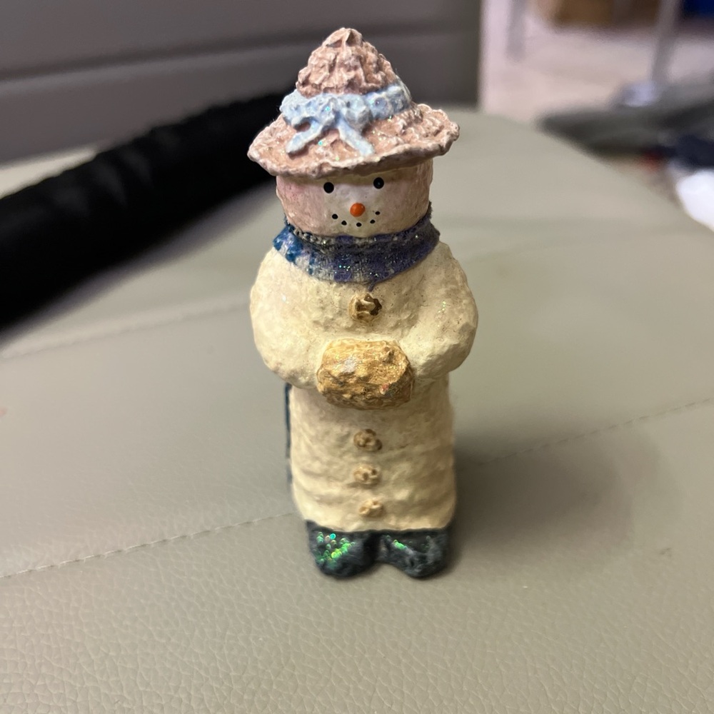 Charming Snowman Figurine with Blue and Cream Accents Collectible